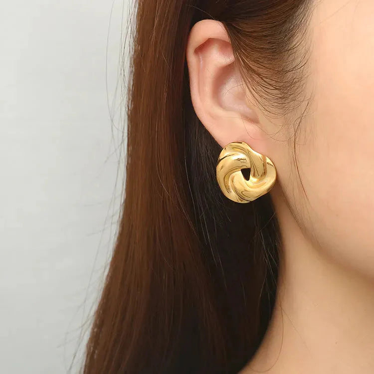 The Sculptural Knot Studs in 18k Gold Finish